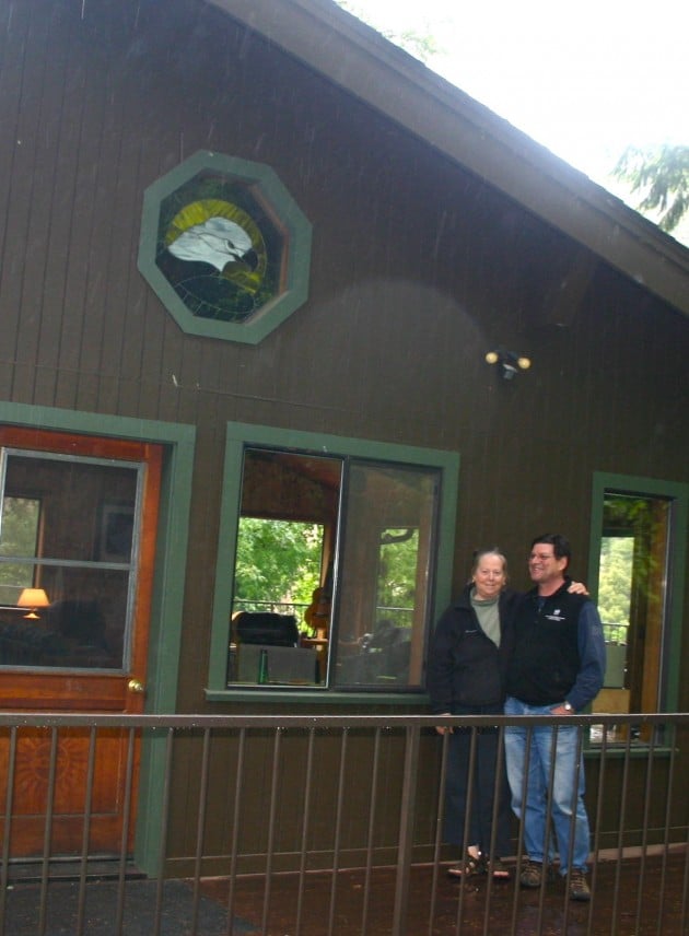 Riverhouse owners pose for photo