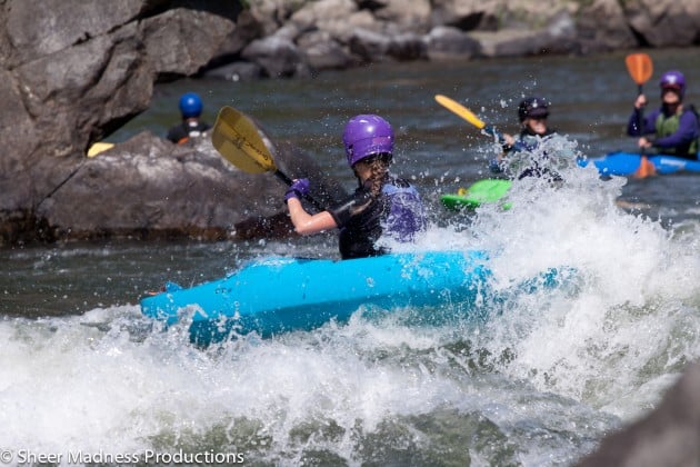 Kayaking a Class III rapid on the Rogue River Kayaking a Class III rapid on the Rogue River